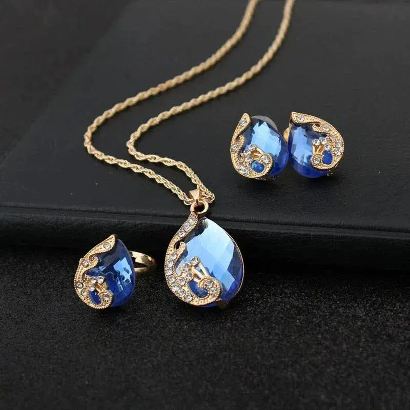 Ensemble de collier et boucles d'oreilles en cristal bleu avec dorure en or