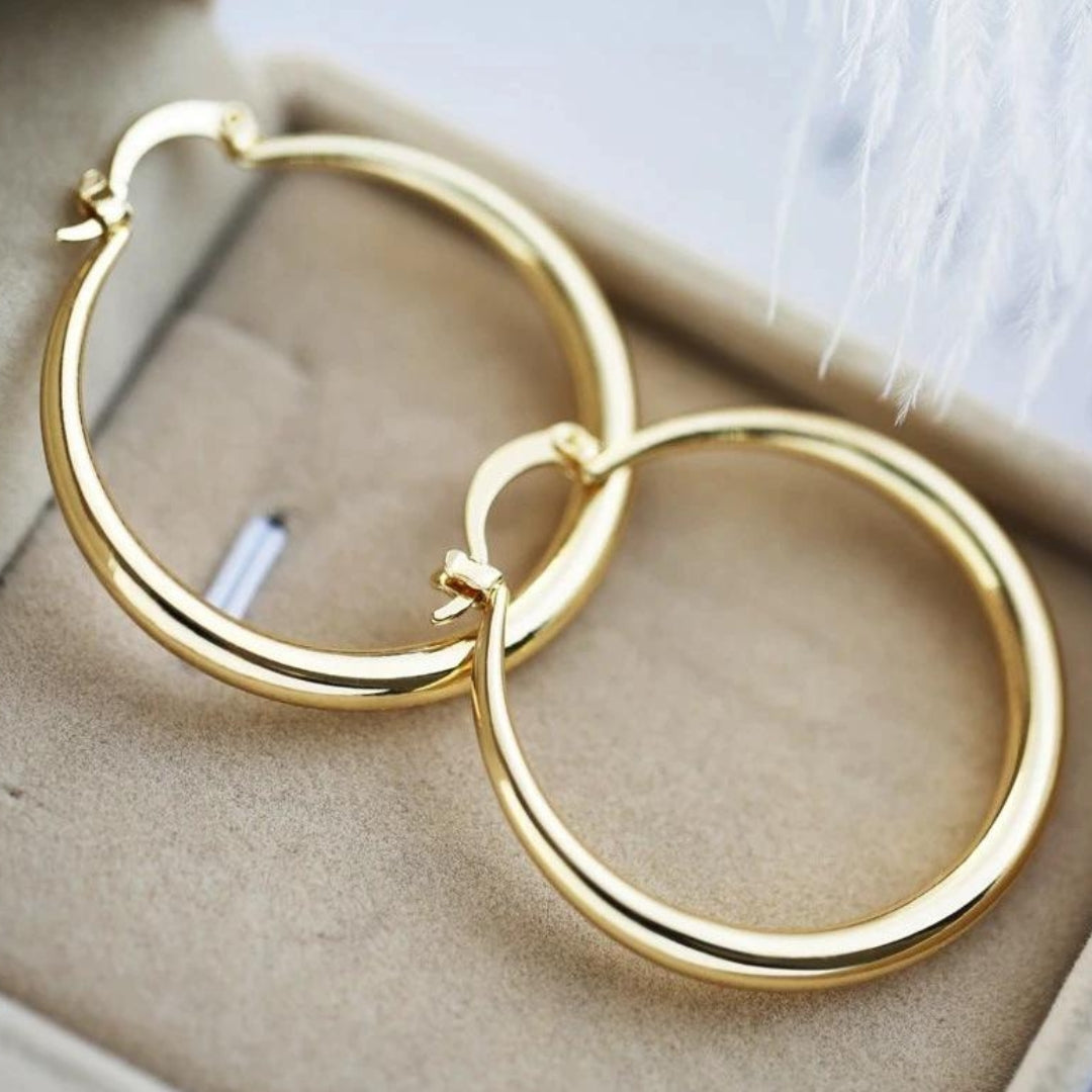 Grandes boucles d'oreilles en forme d'anneau en or