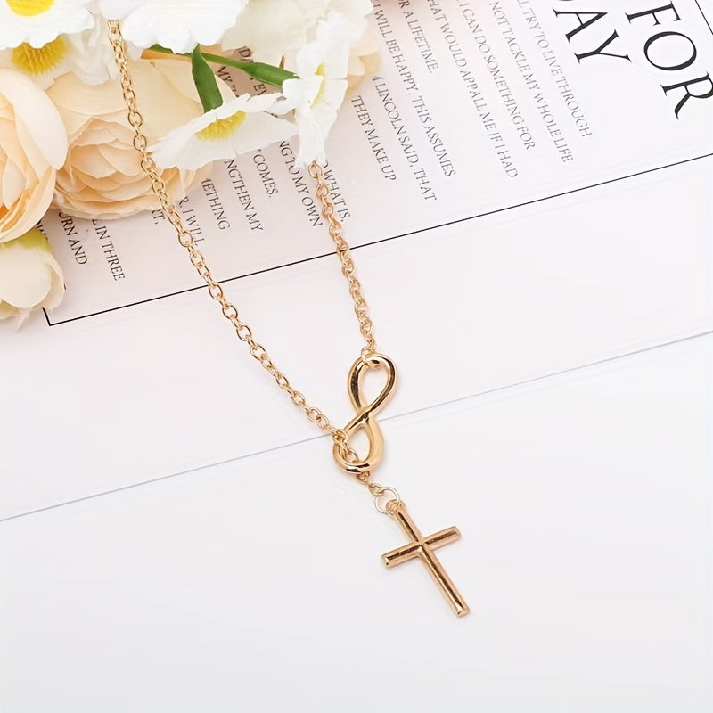 Pendentif croix éternelle en or blanc