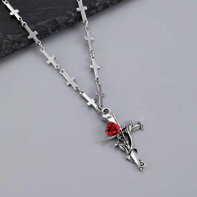 Pendentif et rose rouge en or blanc